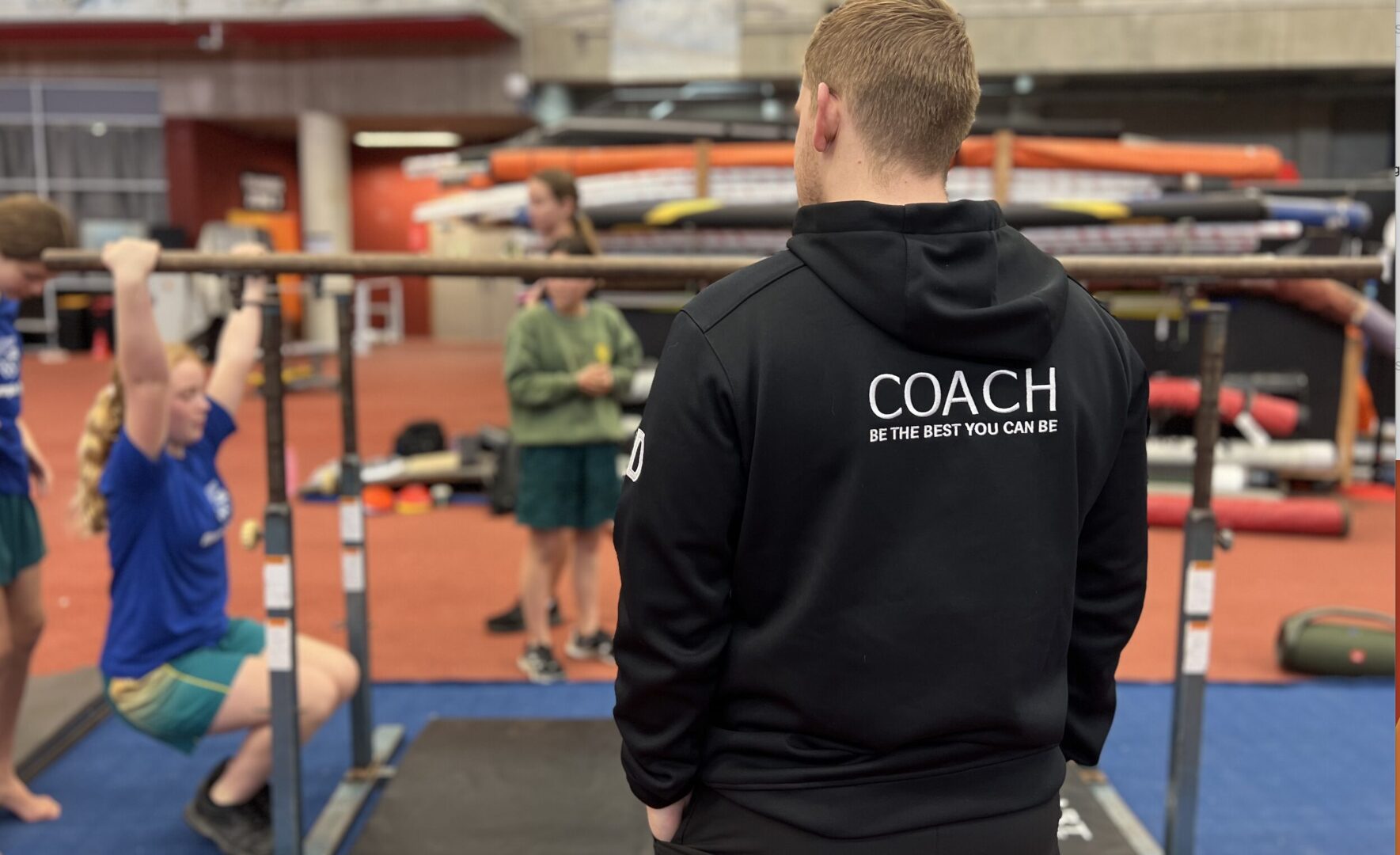 An Athlete Development Coach observes an athlete perform an activity