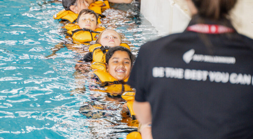 Schools Programme Schools Programme, teacher instructing children in lifejackets