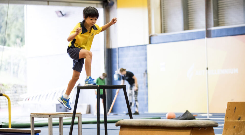 Child on obstacle course at athlete development holiday academy